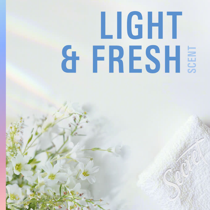 Light and fresh scent with white flowers and a soft towel on a light background showcasing tranquility and cleanliness