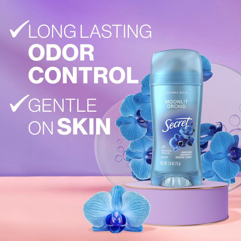 Secret deodorant stick with Moonlit Orchid scent surrounded by light blue orchids, highlighting long-lasting odor control and gentle on skin benefits
