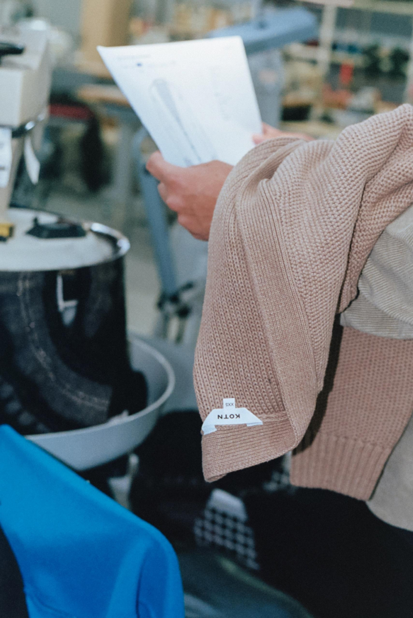 Sample making of our knitted cardigan. Porto, Portugal.