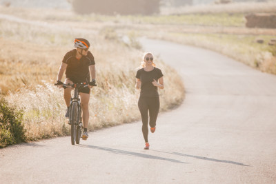 Enhancing Your Health Through Cycling or Running—Which Is Better?