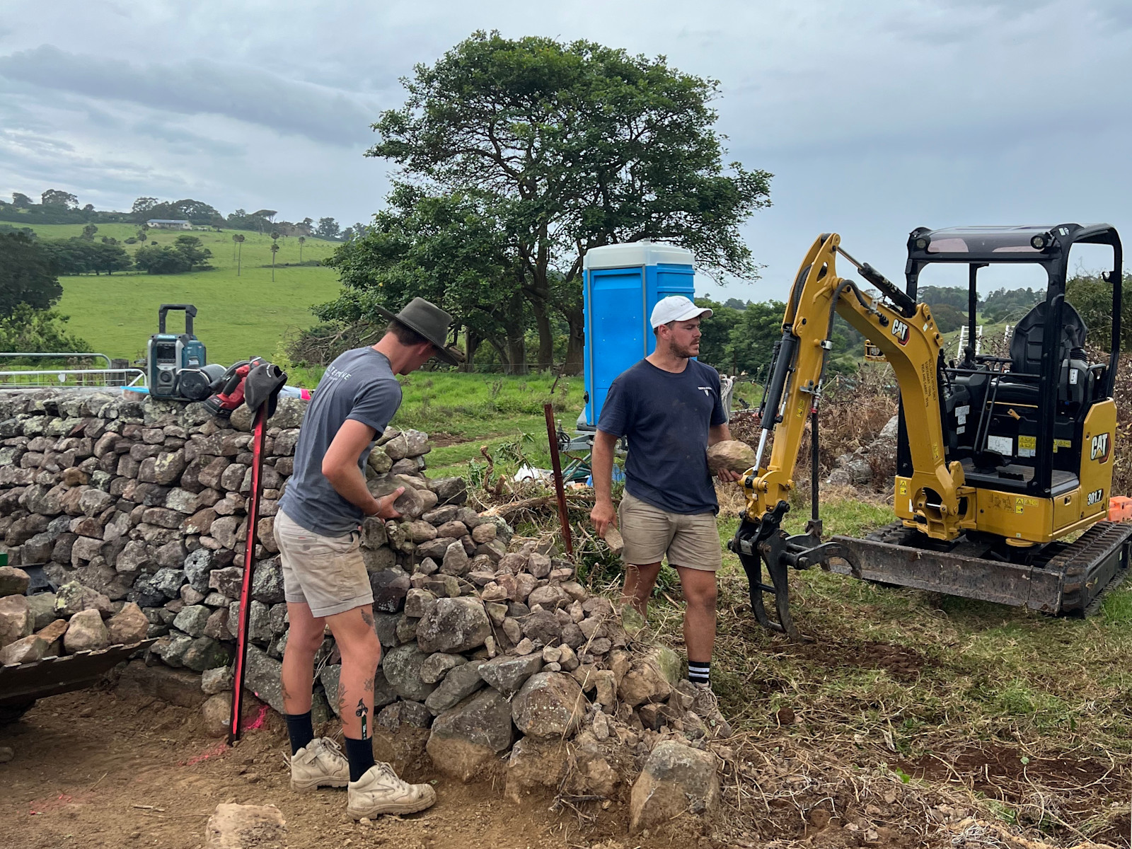 Rock walls coming down as we clear space for the new entrance — image 4
