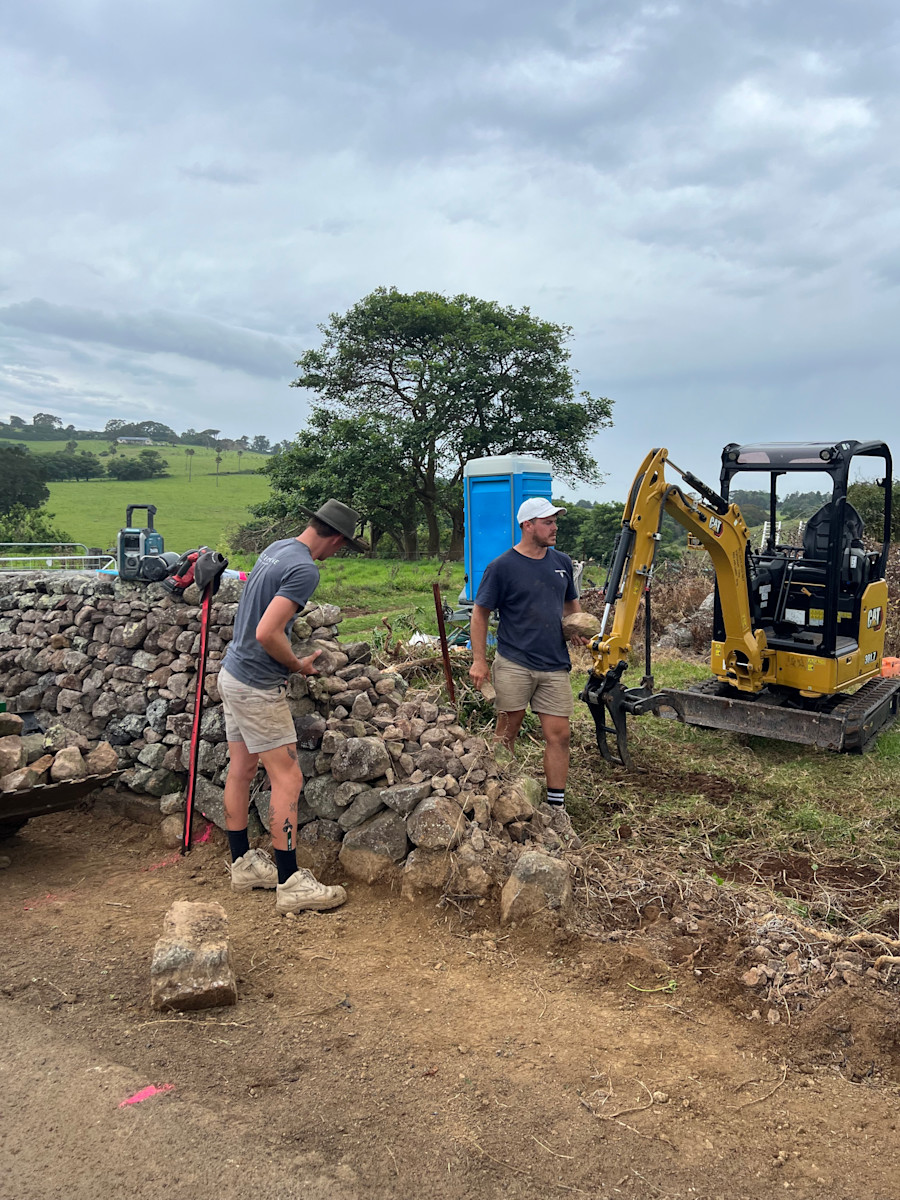 Rock walls coming down as we clear space for the new entrance — image 4