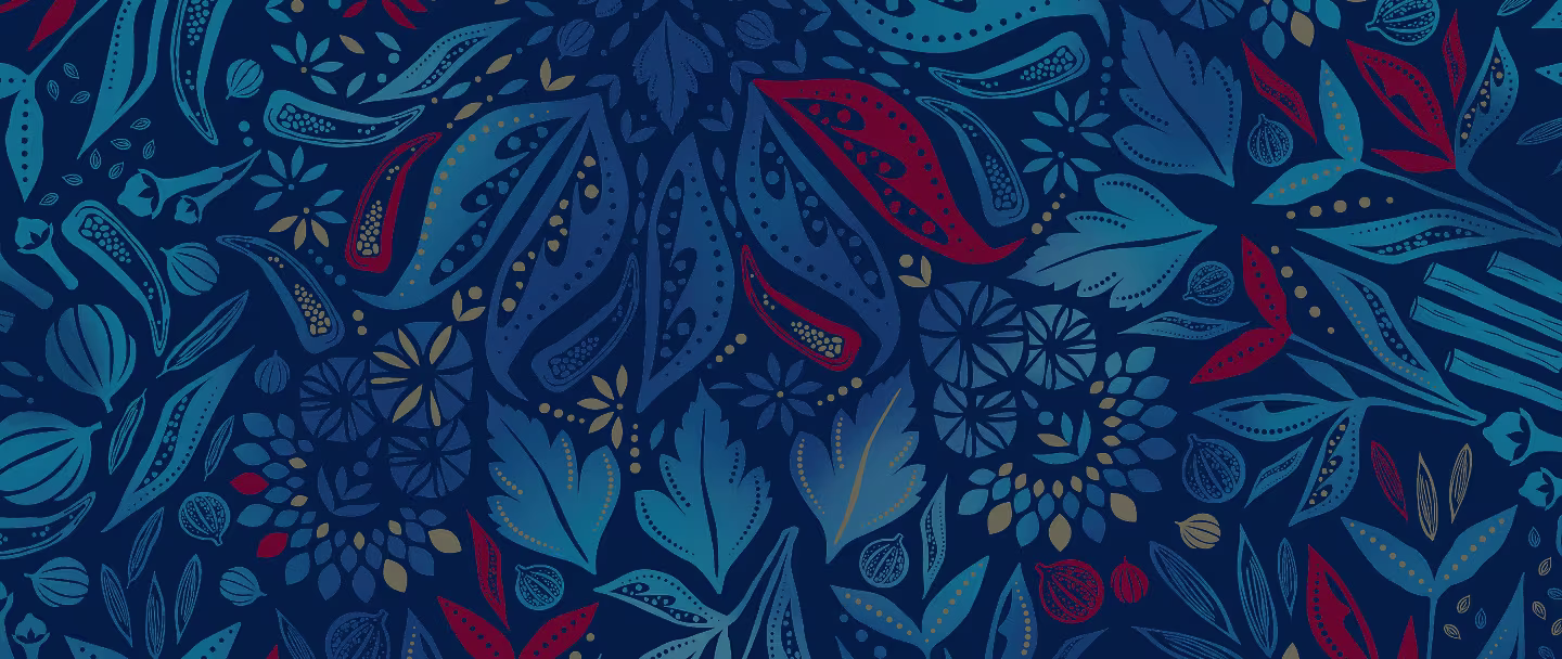Deep blue background with an intricate pattern of paisley, leaves and flowers in blue, teal and red.