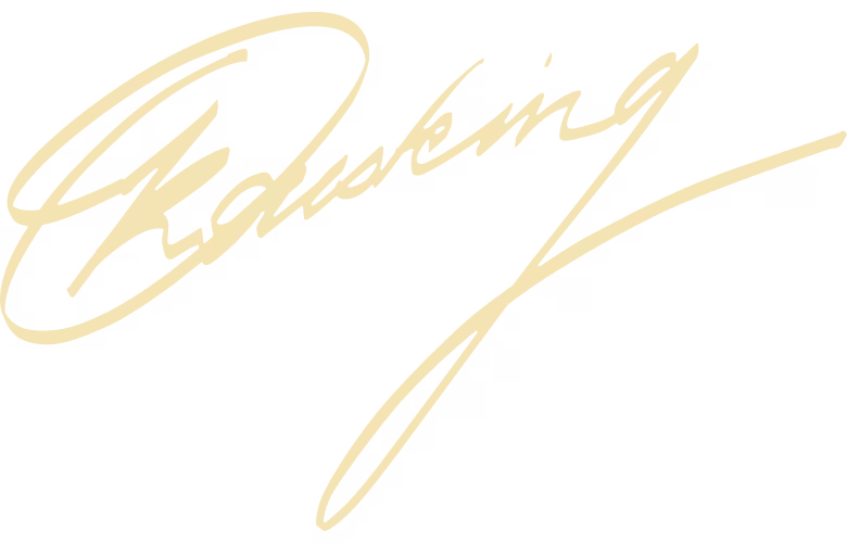 A black, cursive signature with bold, flowing lines on a light background.