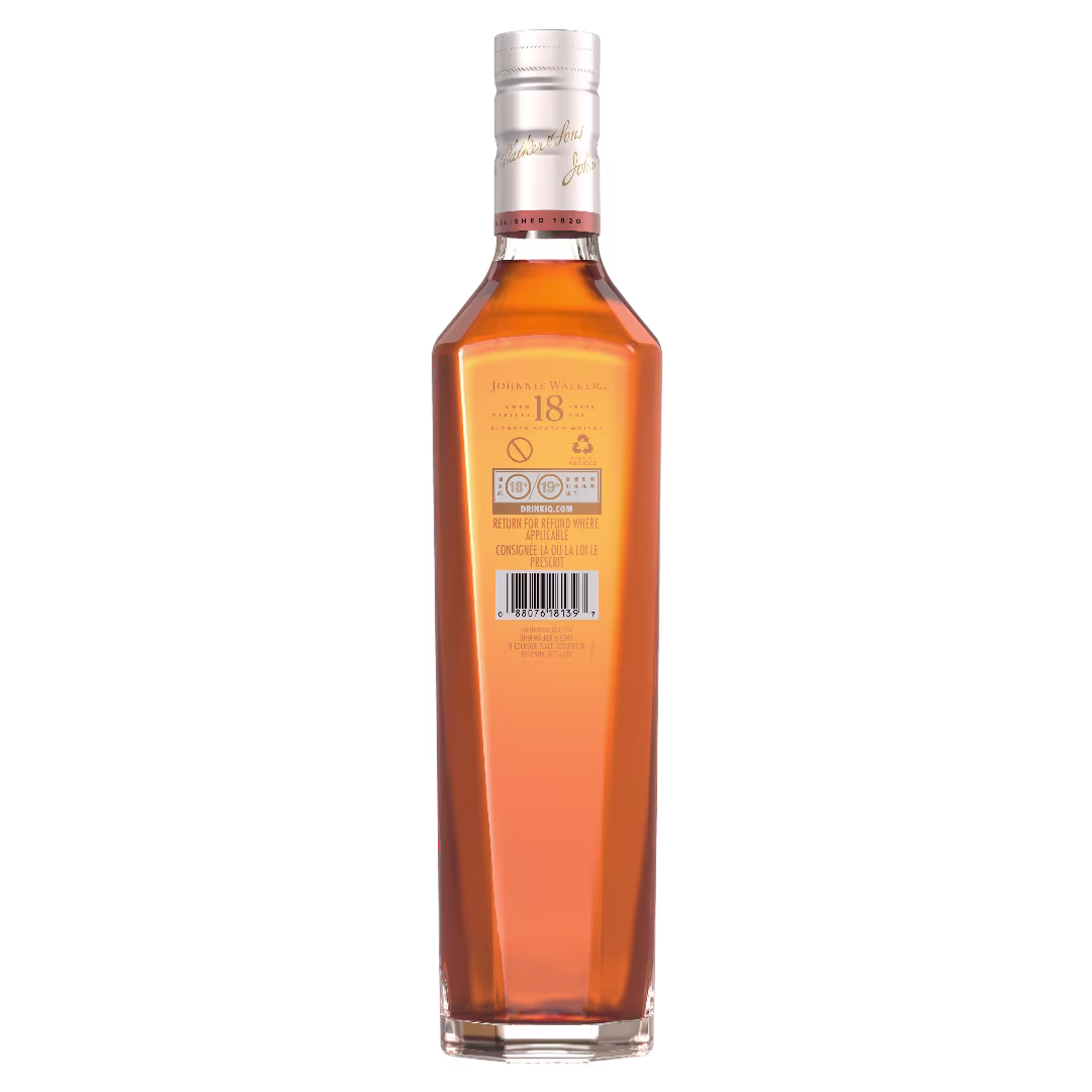 A tall, rectangular bottle of whisky with amber liquid inside, featuring a silver cap and a label on the back displaying symbols, text, and a barcode.