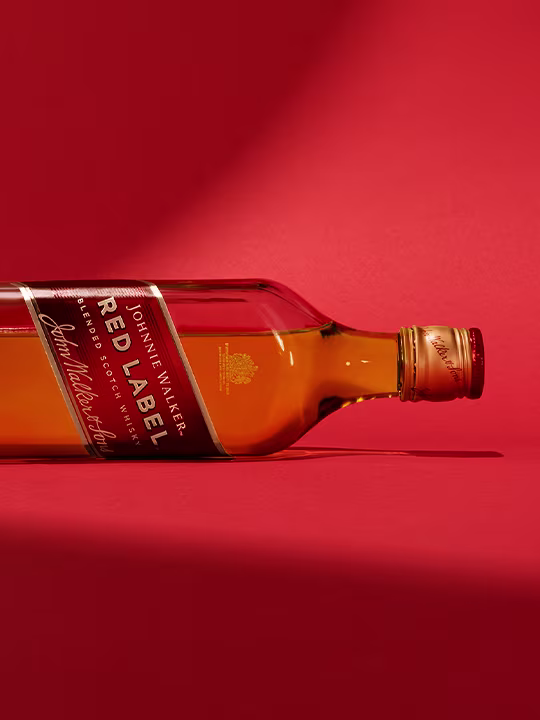 Close up of Johnnie Walker Red Label on its side