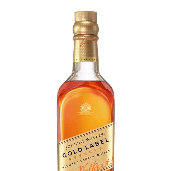 A bottle of Johnnie Walker Gold Label Reserve Blended Scotch. It has a gold leaf label and lid, with a clear view of the amber liquid inside. The label has the brand logo and product details in elegant lettering.