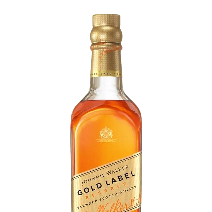 A bottle of Johnnie Walker Gold Label Reserve Blended Scotch. It has a gold leaf label and lid, with a clear view of the amber liquid inside. The label has the brand logo and product details in elegant lettering.
