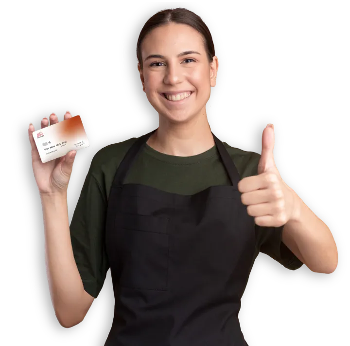 Mujer sosteniendo su tarjeta débito VISA PYMES Mujer sosteniendo su tarjeta débito VISA PYMES