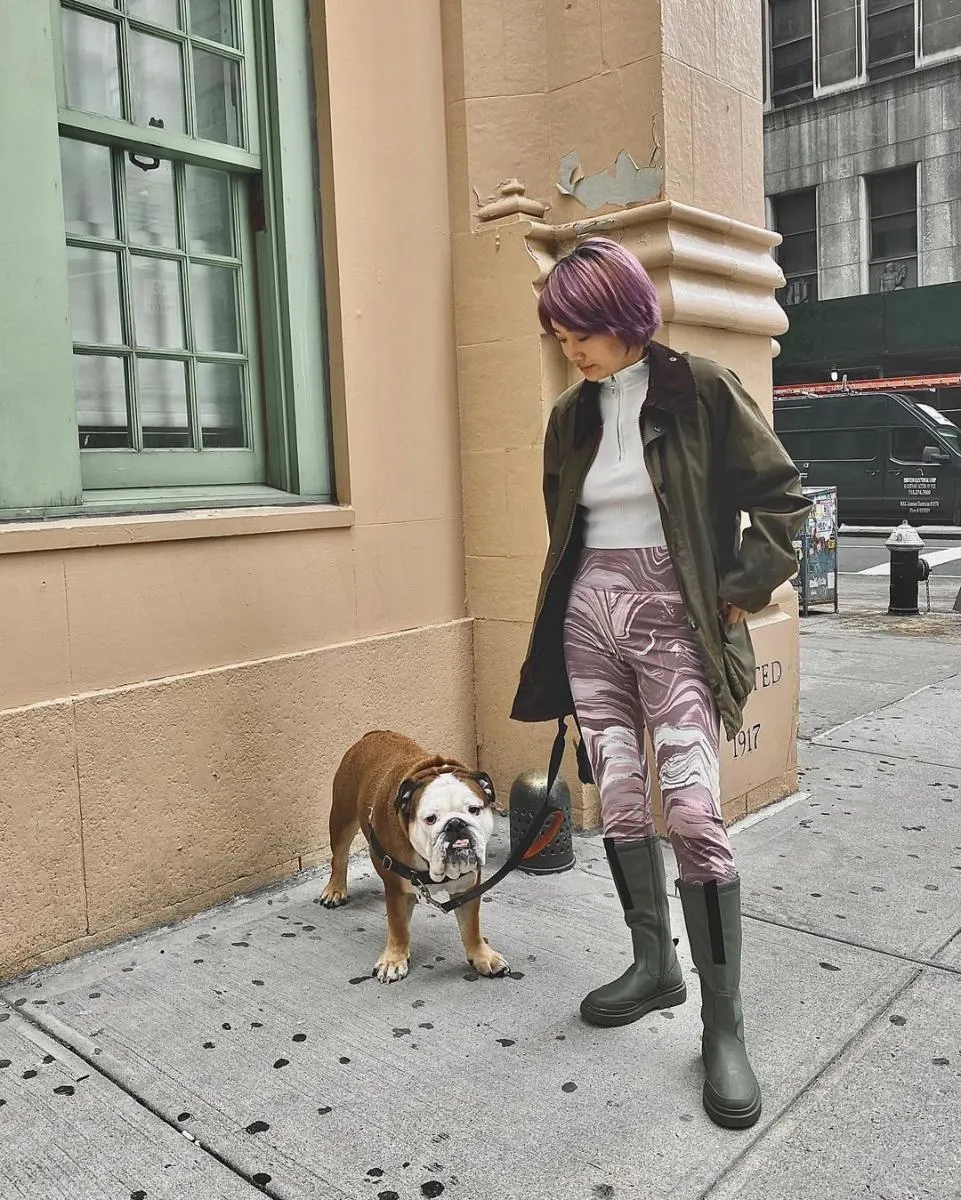 girl and her bulldog on new york city street