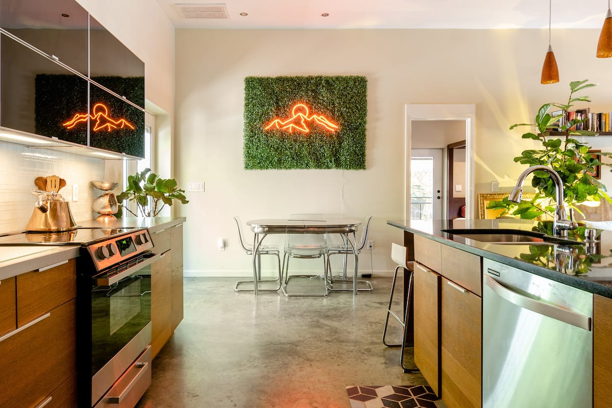 airbnb kitchen with neon sign