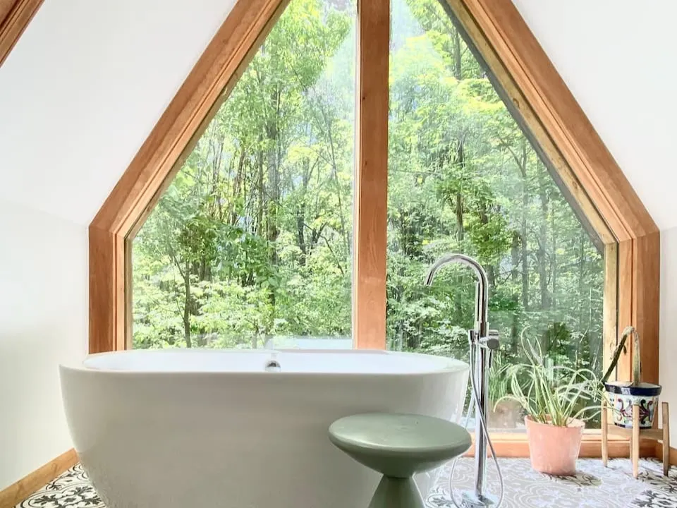 a-frame home bathroom with tub