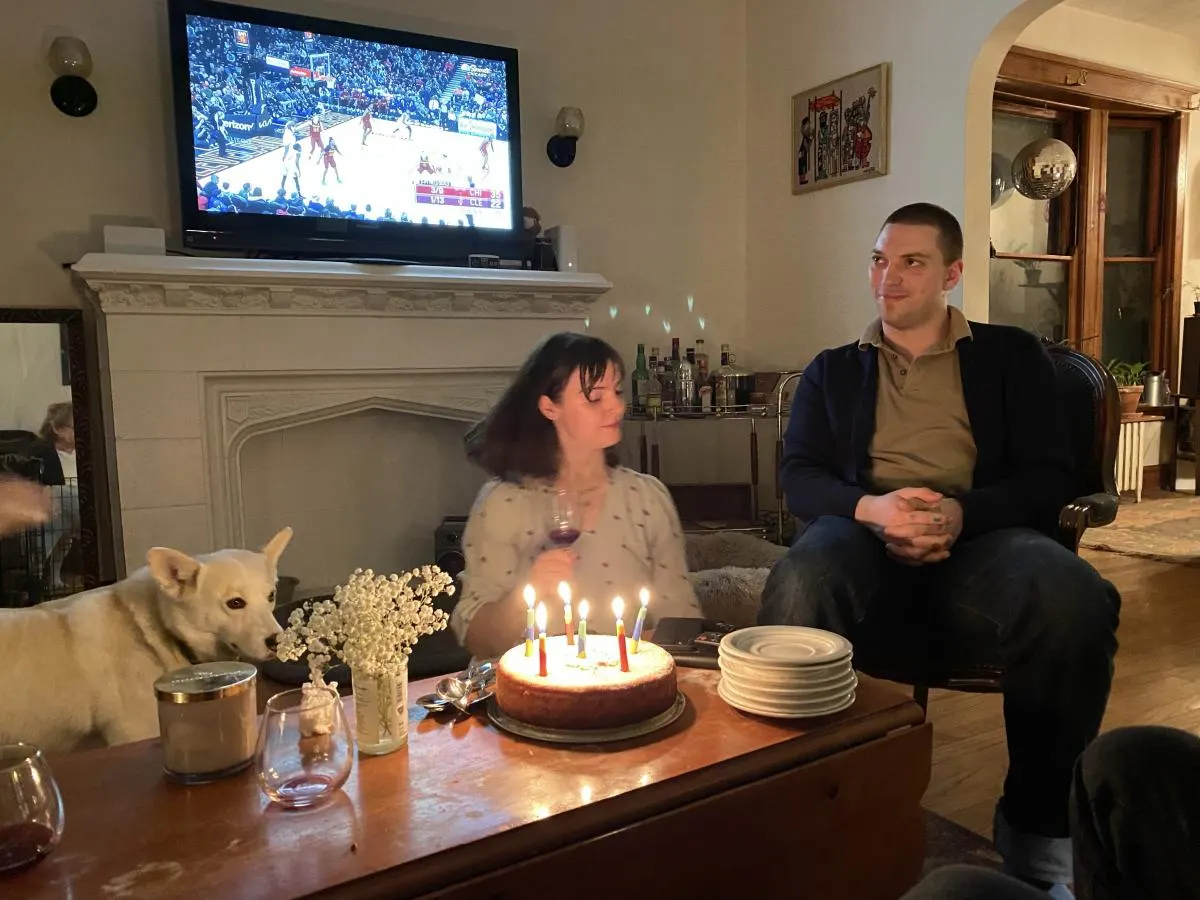 birthday celebration couple with dogs