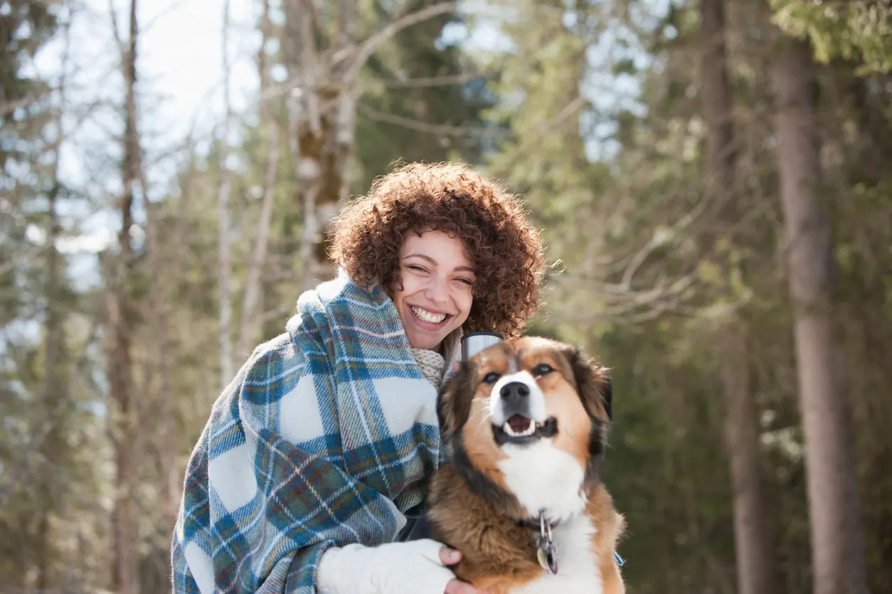 woman and her dog in winter