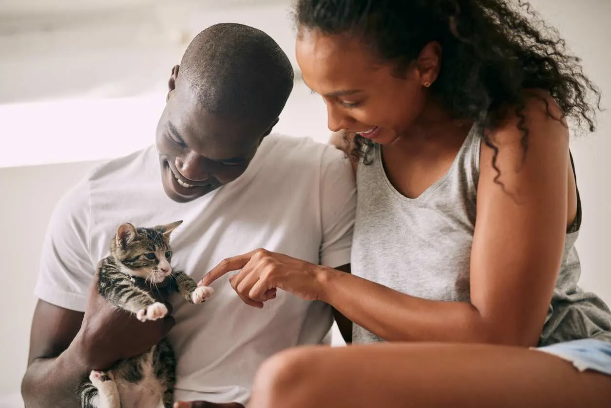 Couple with their kitten
