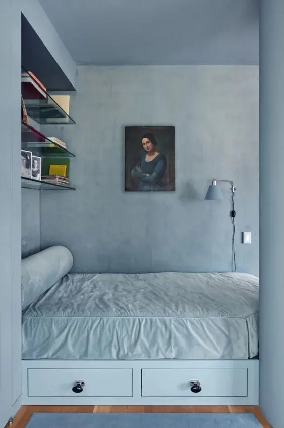 blue color-drenched bedroom