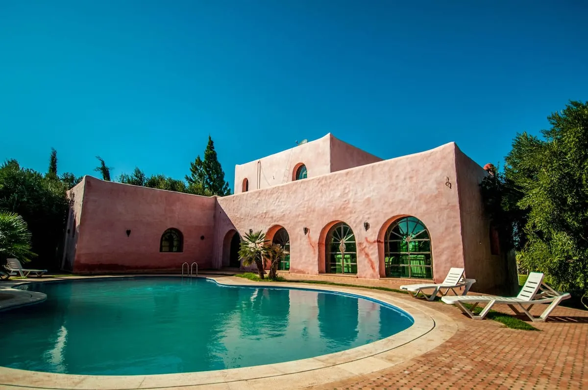 moroccan pink airbnb with pool