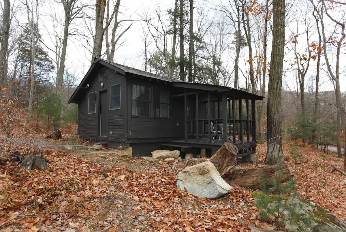 black cabin in the woods of new jersey