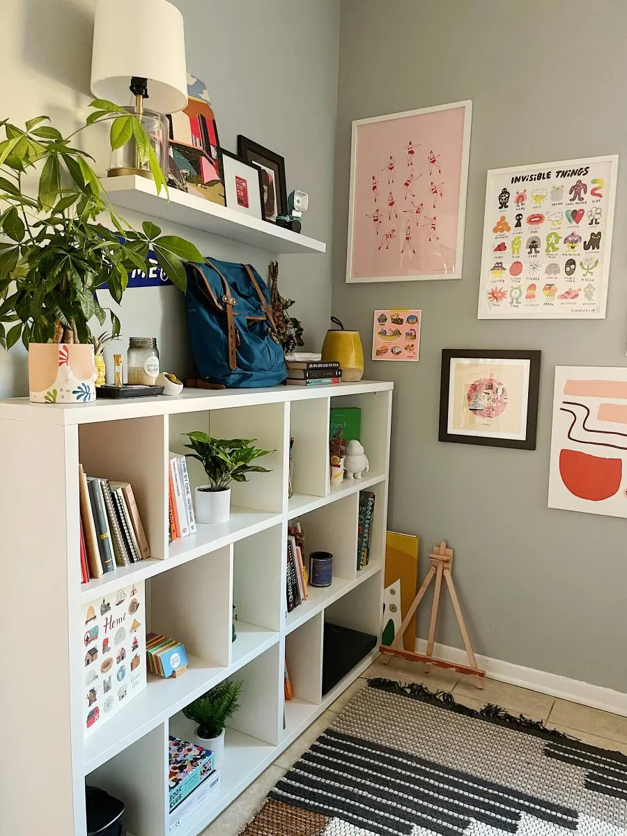 living room shelves with books and artwork