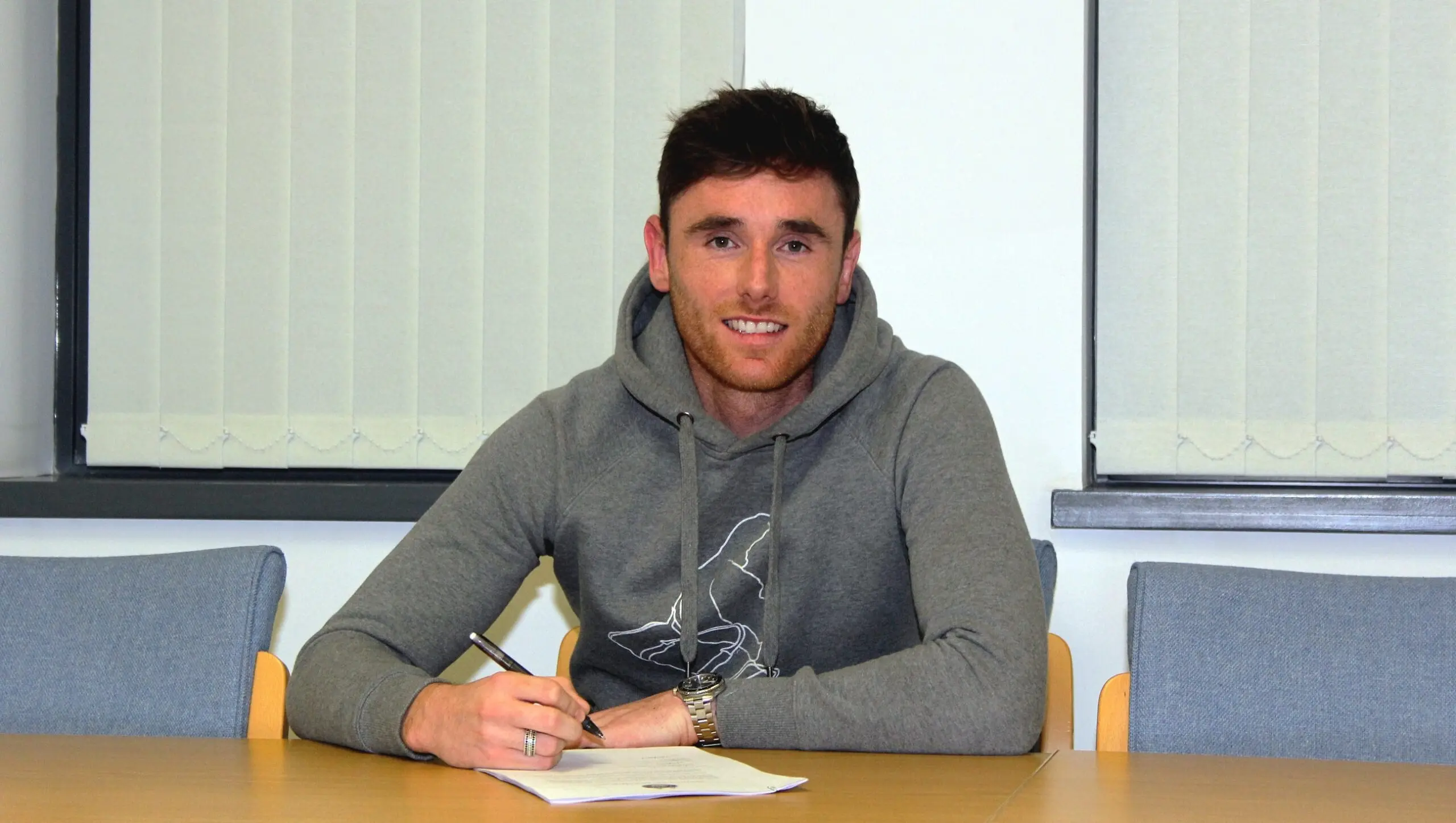 Tansey signs pre-contract agreement