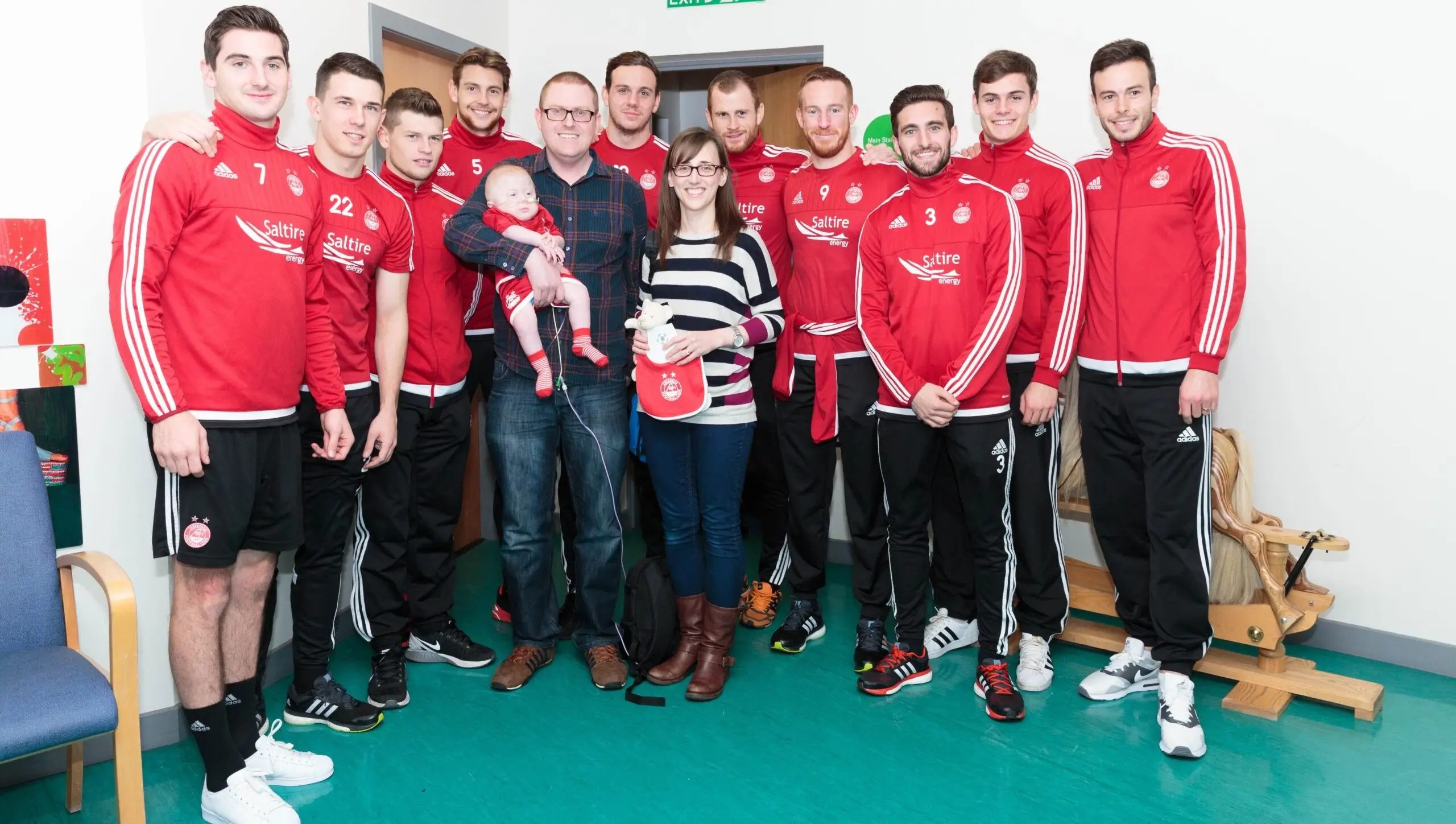 Dons stars play Santa at Children's Hospital