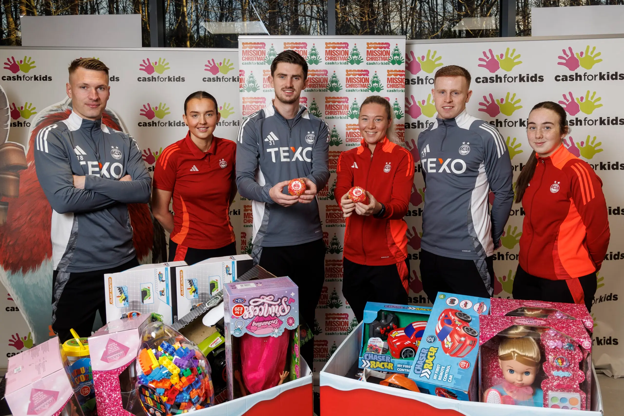 DONS PLAYERS PLEDGE THEIR SUPPORT TO CHRISTMAS TOY APPEAL