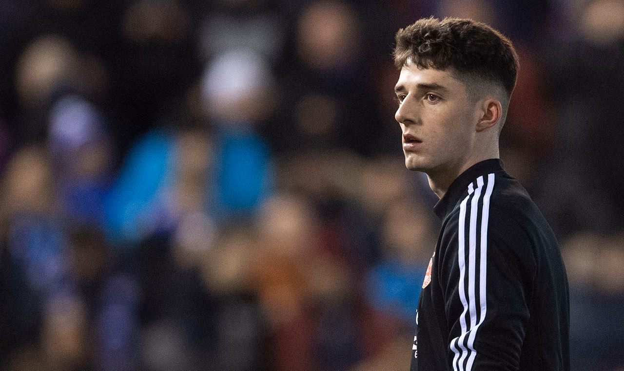 Dons striker signs new deal