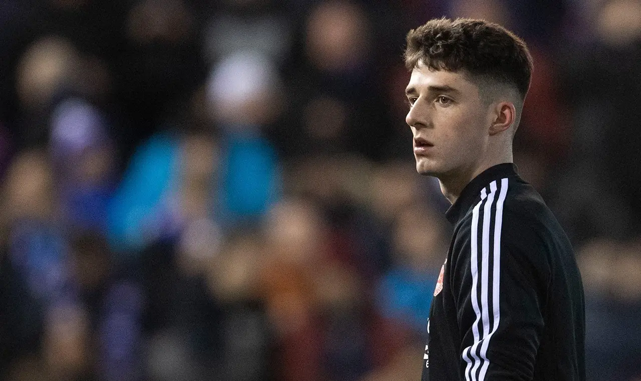 Dons striker signs new deal