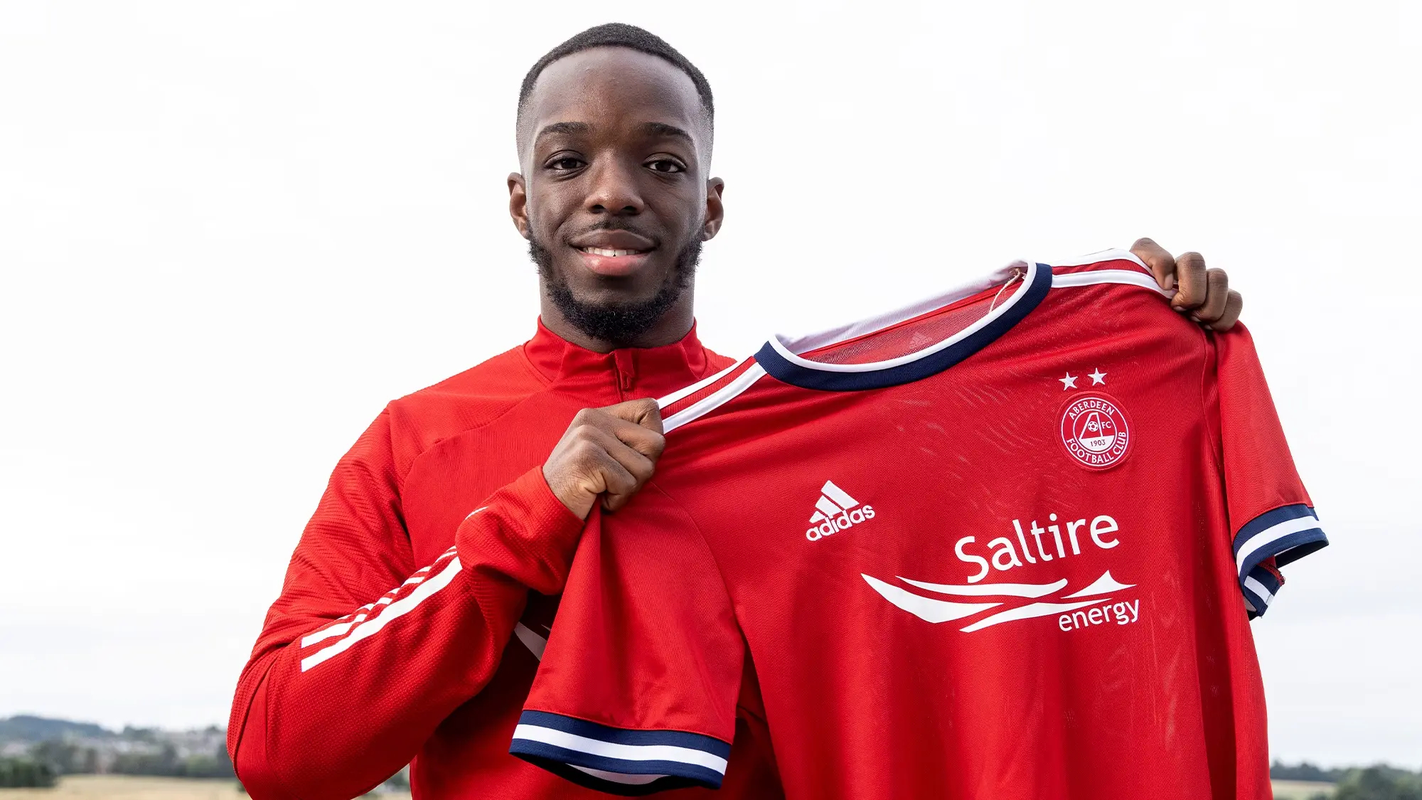 Striker Samuels Signs for the Dons