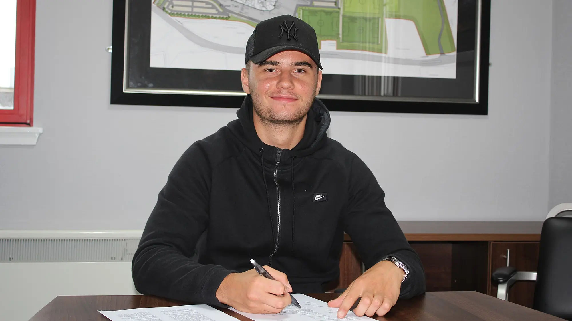 Development Dons | Luc Bollan signs