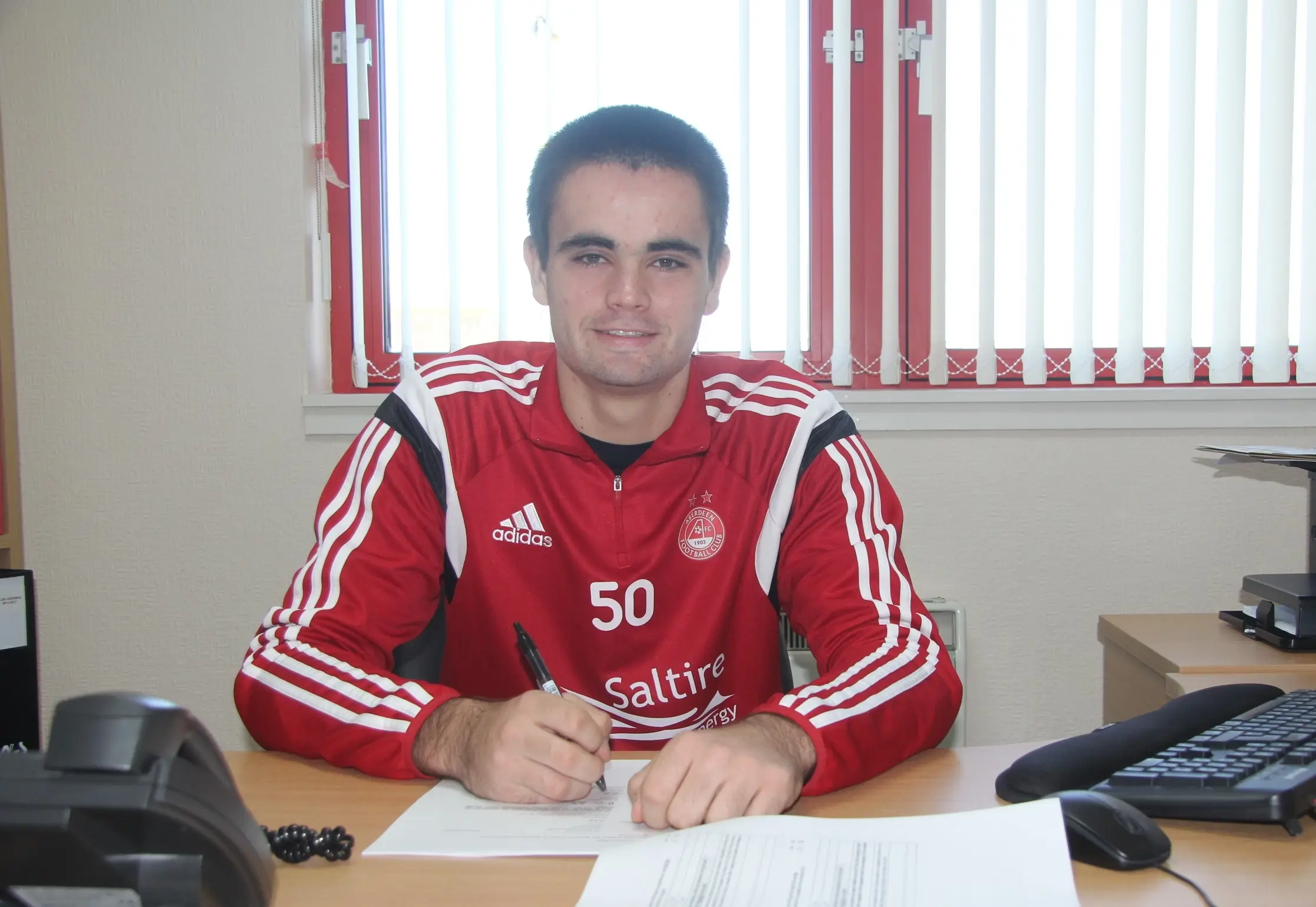 Young goalie pens deals with the Dons