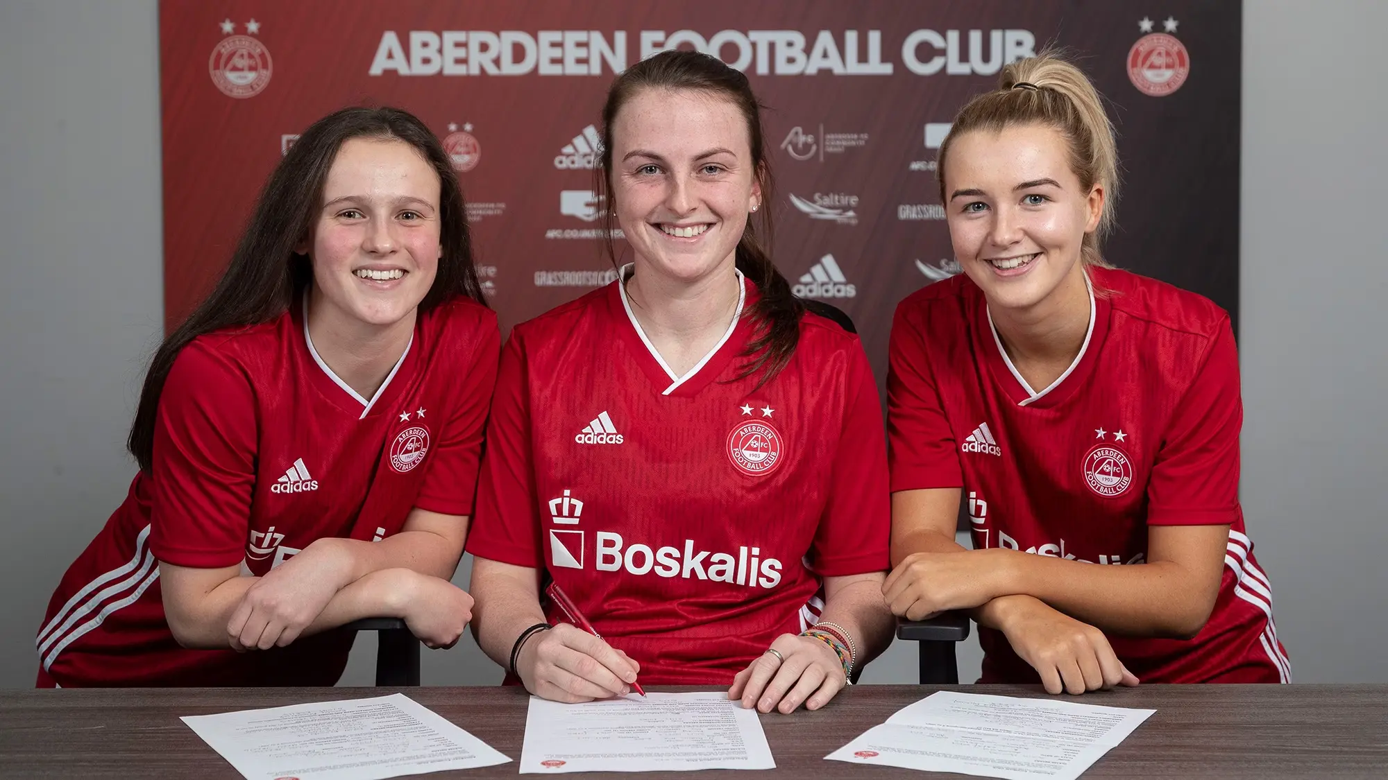 AFC WOMEN LAND TRIPLE CAPTURE