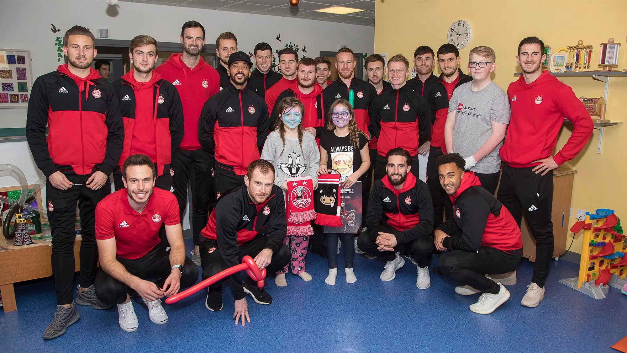 Dons stars play Santa at Children’s Hospital