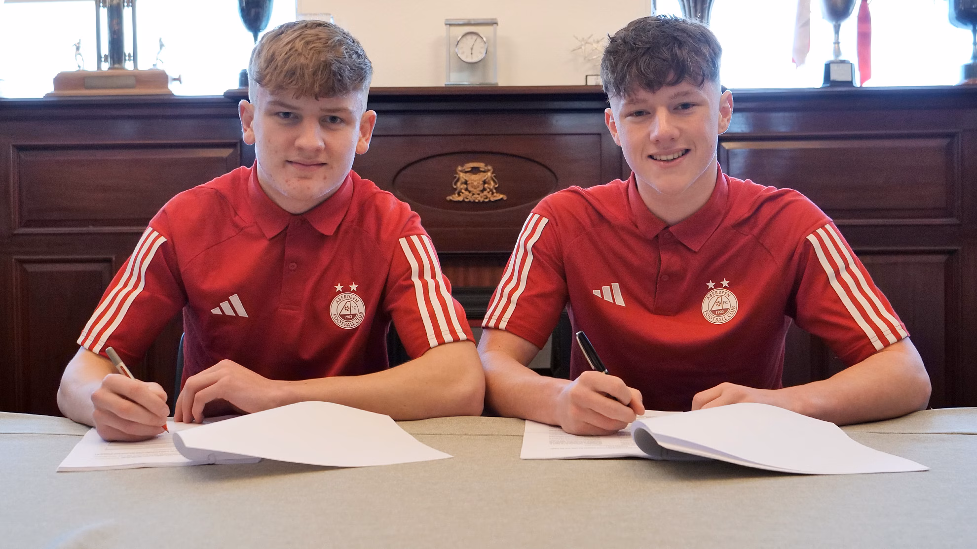 Young midfielders sign new deals image