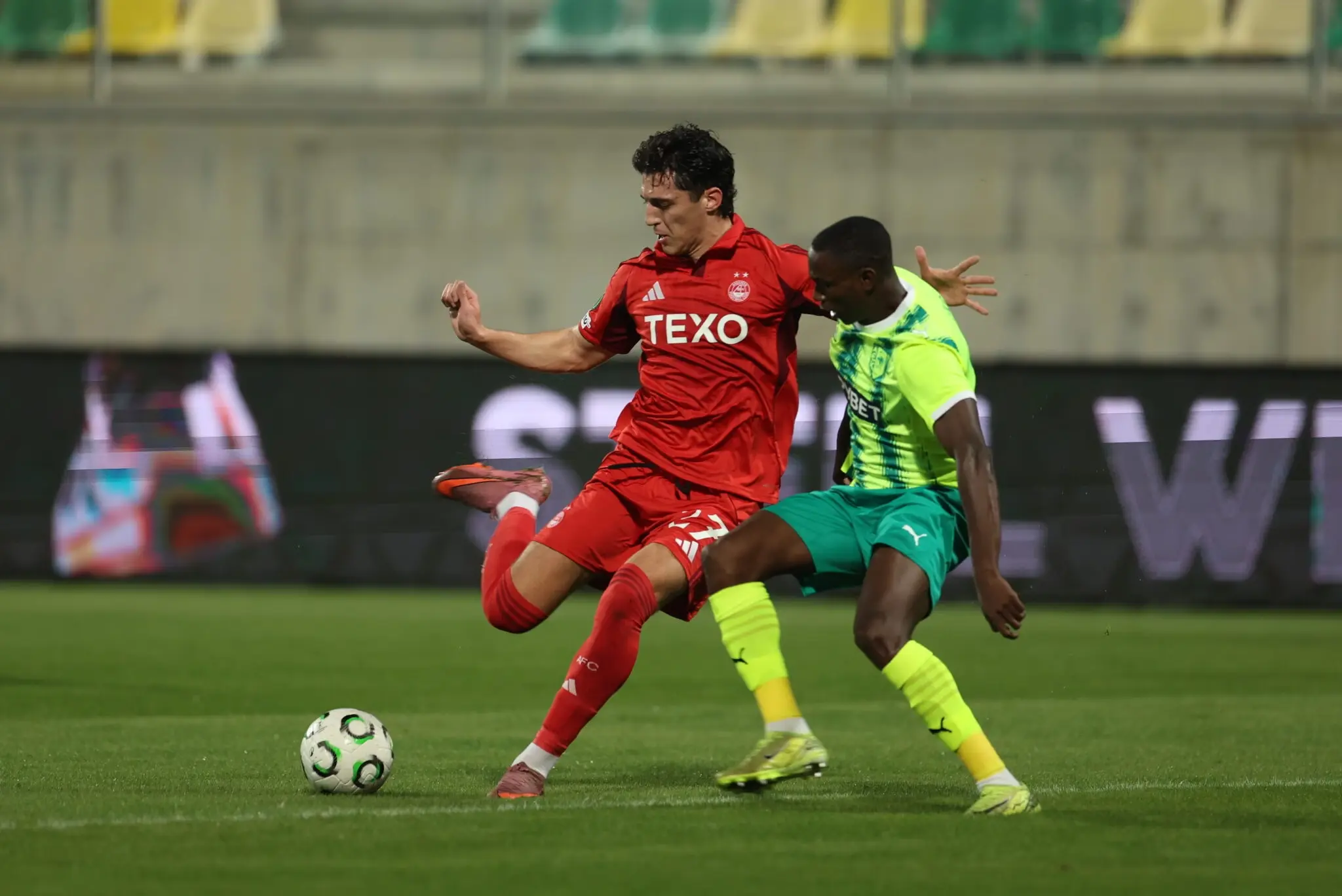 Dons grind out a point in Larnaca image