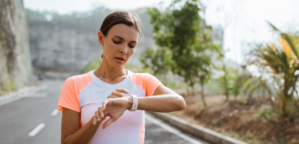 AdobeStock 332344743 1240x600 Woman checking her watch 