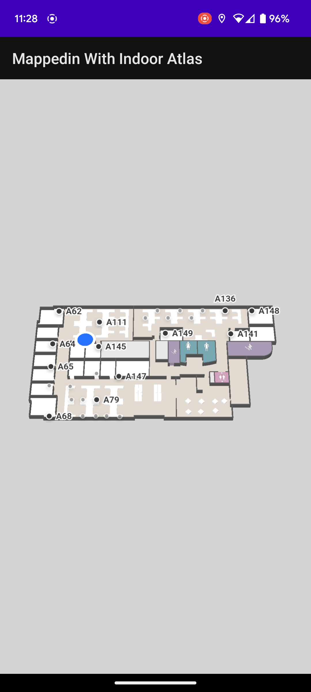 Office map with moving blue dot showing the user's location.