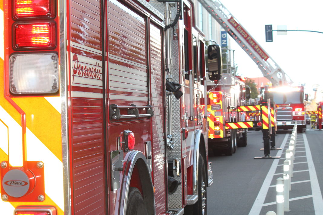 Fire trucks lined up on a street