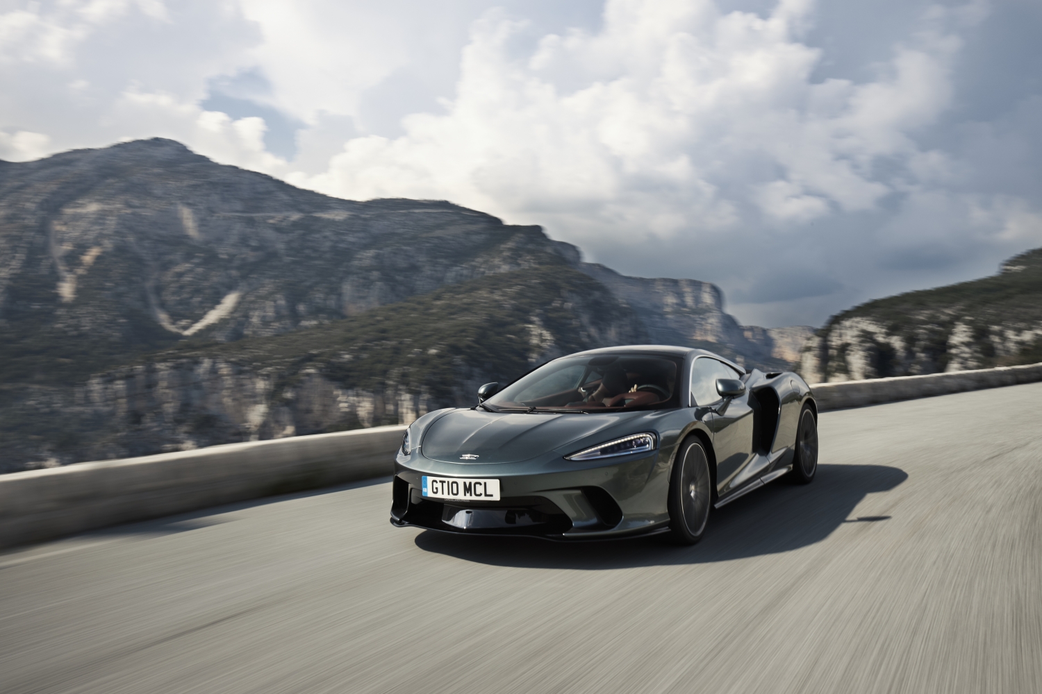 The McLaren GT along a beautiful stretch of road