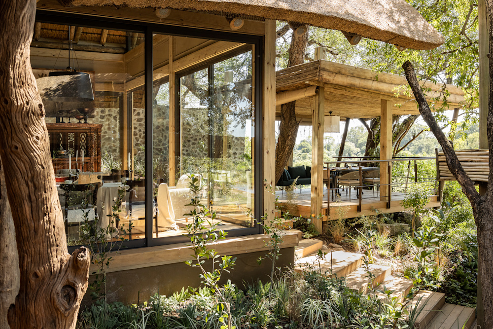 The changes made enhance the lodge's relationship to its natural surroundings, connecting guests intimately with the setting