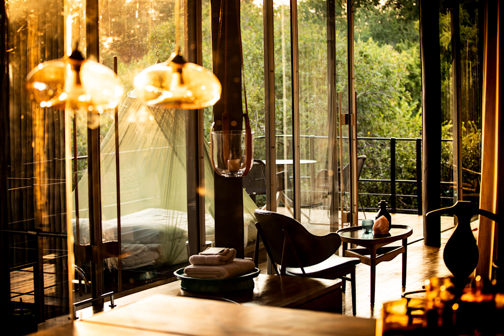 Designed to be both cocooned within the landscape, and open to the elements, the suites are textured and layered and yet at one with the bush