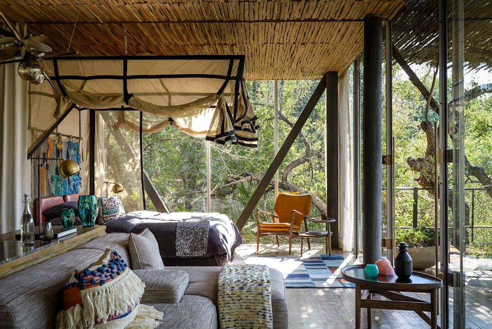 A series of texturally rich, secluded spaces close to the river, Singita Sweni Lodge offers a cocooning, tranquil experience of the bush