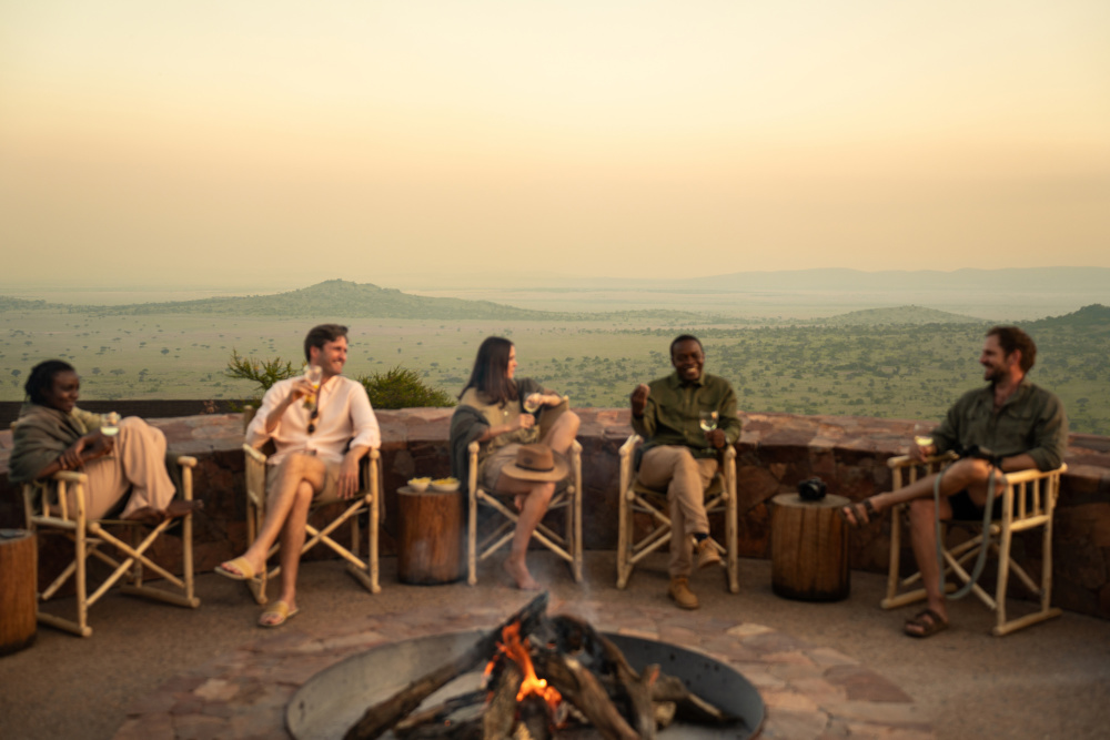 Gathering around a fire is an ancient ritual, one that forms a central part of a day in the bush