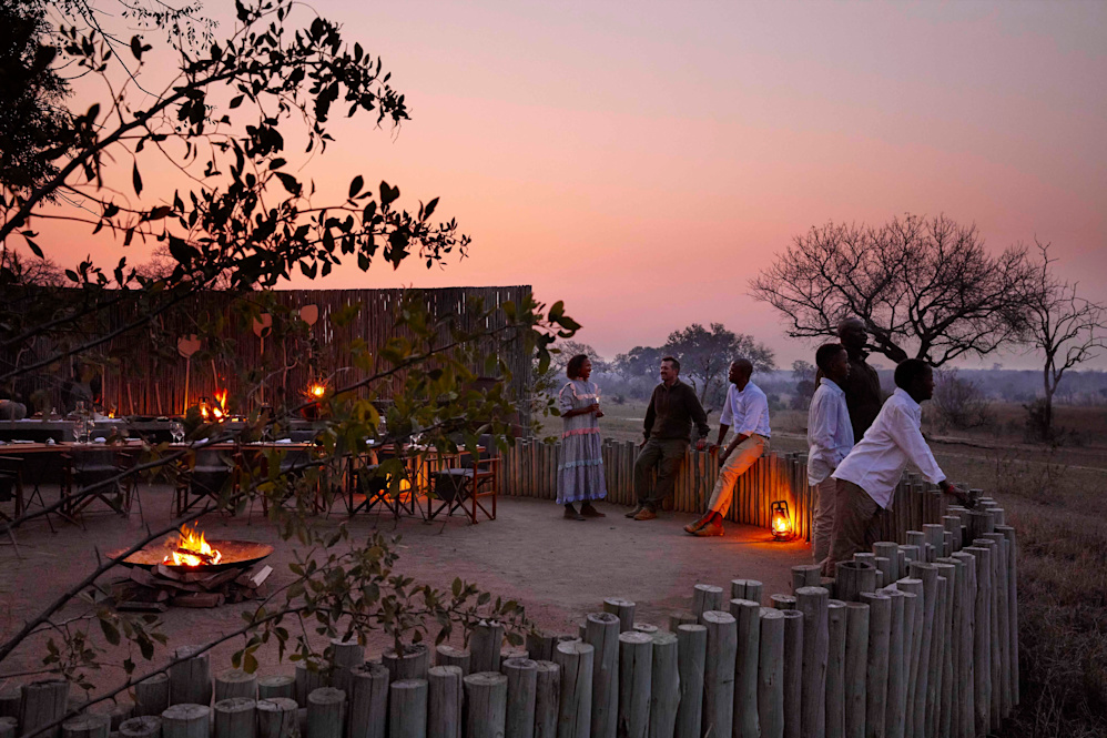 Outdoor Boma area with guests at Castleton