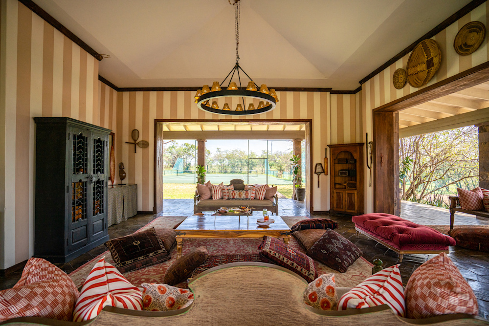 An eclectic mix of artisanal items and locally printed fabric gave Sasakwa's existing elegance a subtle overhaul, without changing its identity