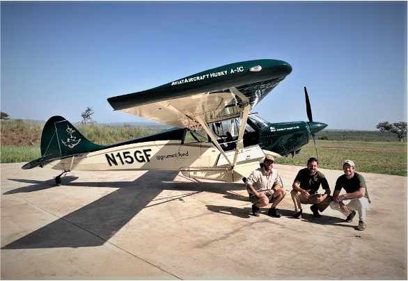 Wayne, George and Grant with the aircraft at the new conservation hanger.