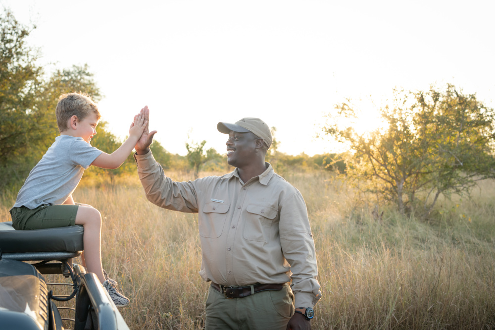Singita's Field Guides and Trackers take pride in sharing their extensive knowledge with young guests 
