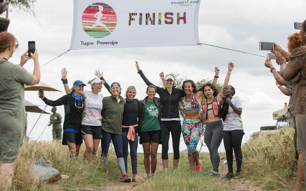 Marietta and the other participants celebrate the end of the final day of running.