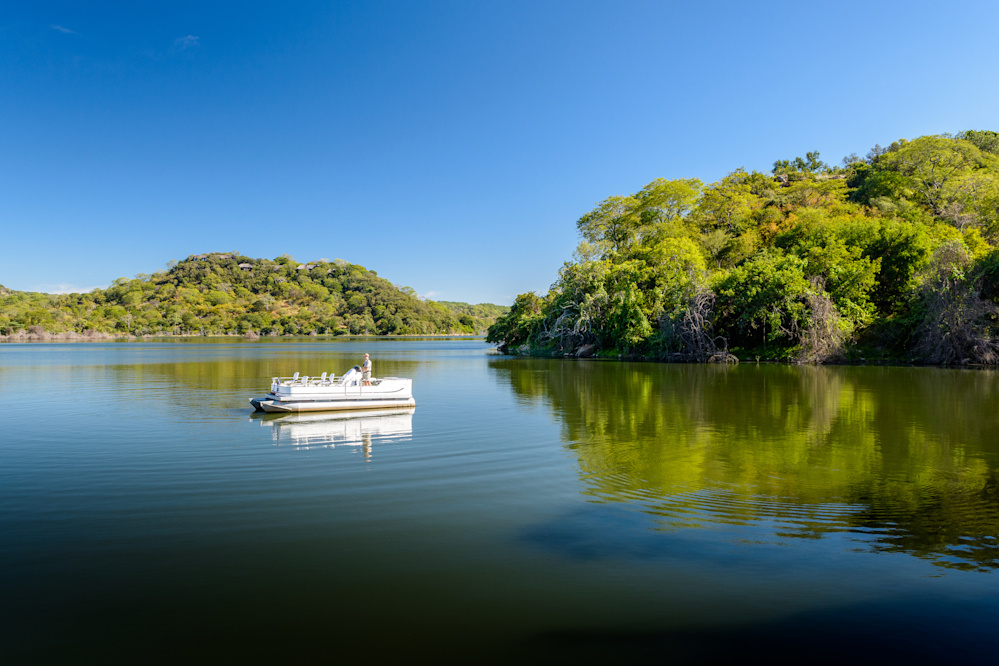 The magnificent Malilangwe Dam allows guests to appreciate the scenery and wildlife from an entirely different perspective on the water