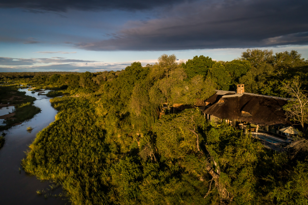 Singita Ebony Lodge – set amid the trees and overlooking the Sand River – is a restful and intimate lodge with a deep connection to nature and our purpose